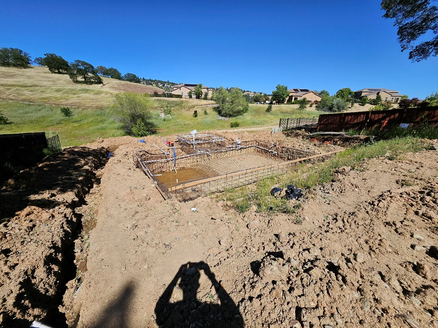 Initial pool excavation on the Folsom sloped lot