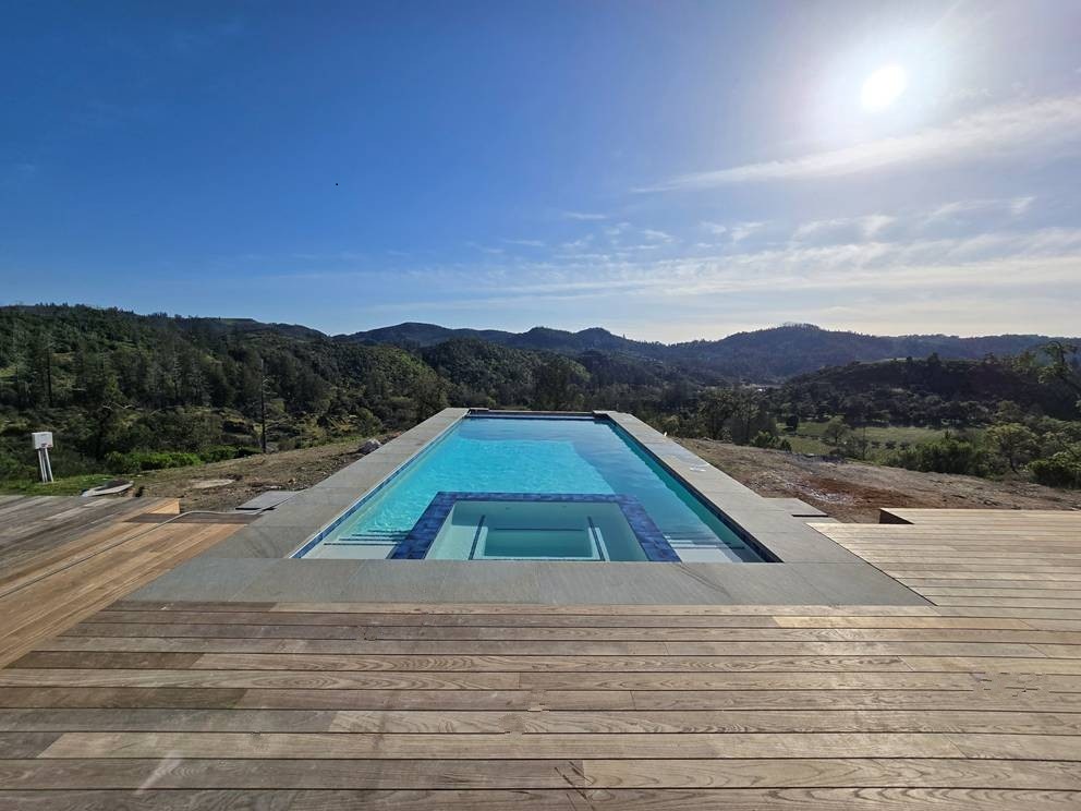 Calistoga pool with amazing view and bluestone coping and wood decking