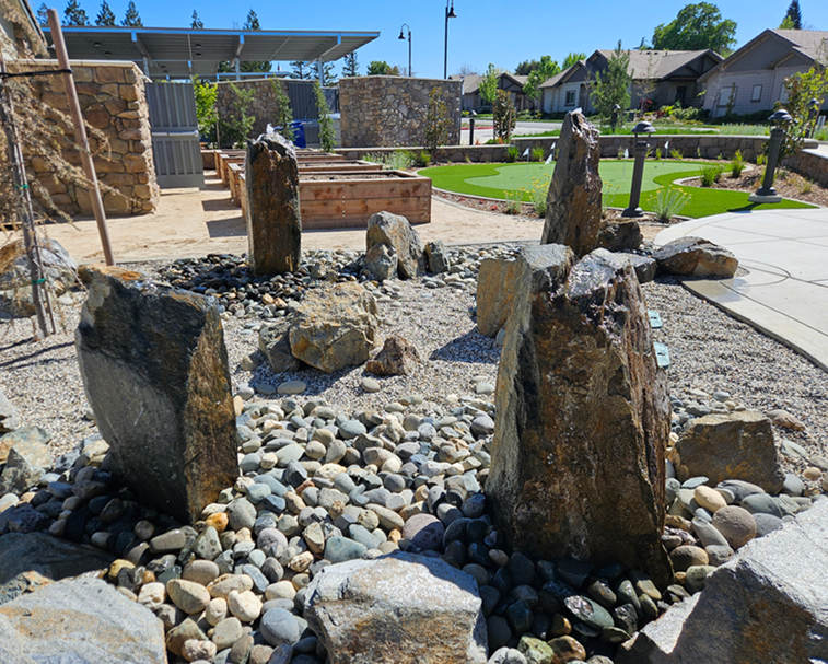 Multi boulder rock fountain custom built for senior living apartments in Auburn, Califoria