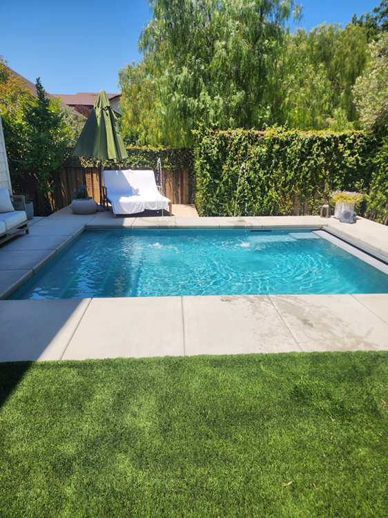 Small cocktail pool with deck jets